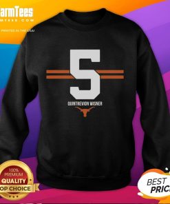 Alt Text: Quintrevion Wisner wearing a 5-stripe sweatshirt featuring Texas Longhorns football logo.