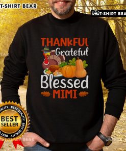 Cozy Thanksgiving sweatshirt featuring 'Thankful Grateful Blessed Mimi' text, perfect for holiday celebrations.