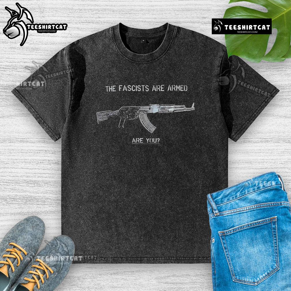 Top The Fascists Are Armed Are You Washed T Shirt Top The Fascists Are Armed Are You washed t-shirt design featuring bold text on a stylish cotton fabric.