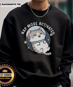Cute cat napping in zero gravity mode, showcasing the 'Cute Cat Nap Mode Activated' sweatshirt design.
