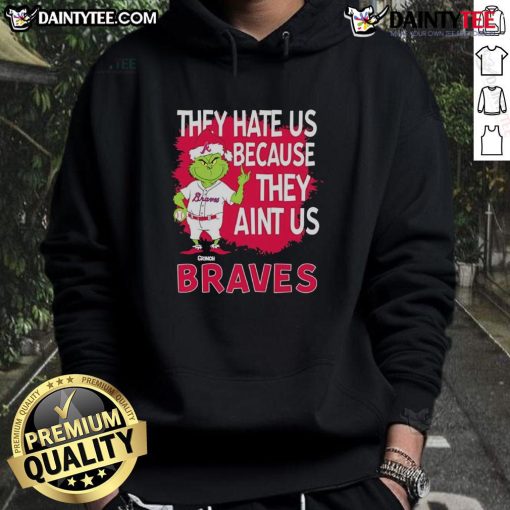 Awesome Atlanta Braves Grinch Christmas hoodie featuring 'They Hate Us Ain't Us' design in festive colors.