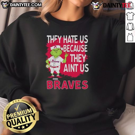 Awesome Atlanta Braves Grinch Christmas sweatshirt featuring 'They Hate Us Ain't Us' design, perfect for fans.