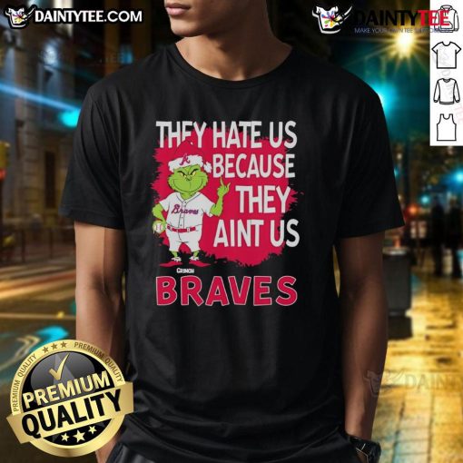 Alt Text: Awesome Atlanta Braves Grinch Christmas T-Shirt featuring 'They Hate Us Ain't Us' design, perfect for holiday cheer.