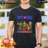Alt Text: Awesome Canada Post X Grinch cosplay T-shirt for Happy Hallothanksmas featuring festive design and vibrant colors.