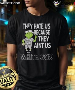 Alt Text: Awesome Chicago White Sox Grinch Christmas T-Shirt featuring 'They Hate Us Ain't Us' design for festive fans.