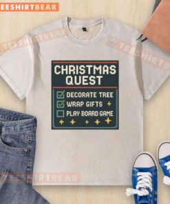 Awesome Christmas Quest t-shirt featuring a festive tree, gifts, and a board game design for holiday fun.
