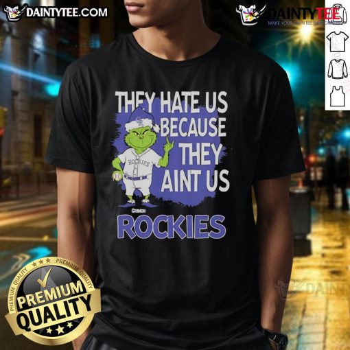 Alt Text: Awesome Colorado Rockies Grinch Christmas T-shirt featuring They Hate Us Ain't Us design for festive fans.