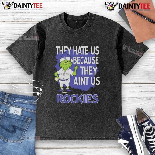 Awesome Colorado Rockies Grinch Christmas t-shirt featuring 'They Hate Us Ain't Us' design in vibrant colors.