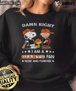 Awesome Giants fan sweatshirt featuring Snoopy and Charlie Brown, perfect for showing team spirit and style.