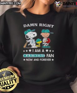Alt Text: Awesome Damn Right I Am A Mariners Fan Now And Forever Snoopy and Charlie Brown sweatshirt displayed on a hanger.