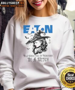 Awesome Eaton Corporation Halloween sweatshirt featuring 'In a World Full of Princesses, Be a Witch' design.