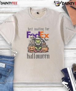 Awesome Grinch Halloween washed t-shirt featuring a playful design, perfect for festive celebrations and FedEx delivery.