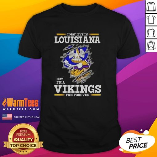 Awesome t-shirt featuring 'I May Live In Louisiana But Im A Minnesota Vikings Fan Forever' design for NFL fans.