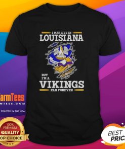 Awesome t-shirt featuring 'I May Live In Louisiana But Im A Minnesota Vikings Fan Forever' design for NFL fans.