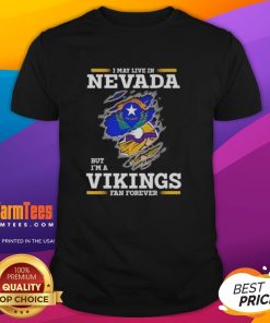 Awesome I May Live In Nevada But I'M A Minnesota Vikings Fan Forever T-Shirt design showcasing team pride and fandom.