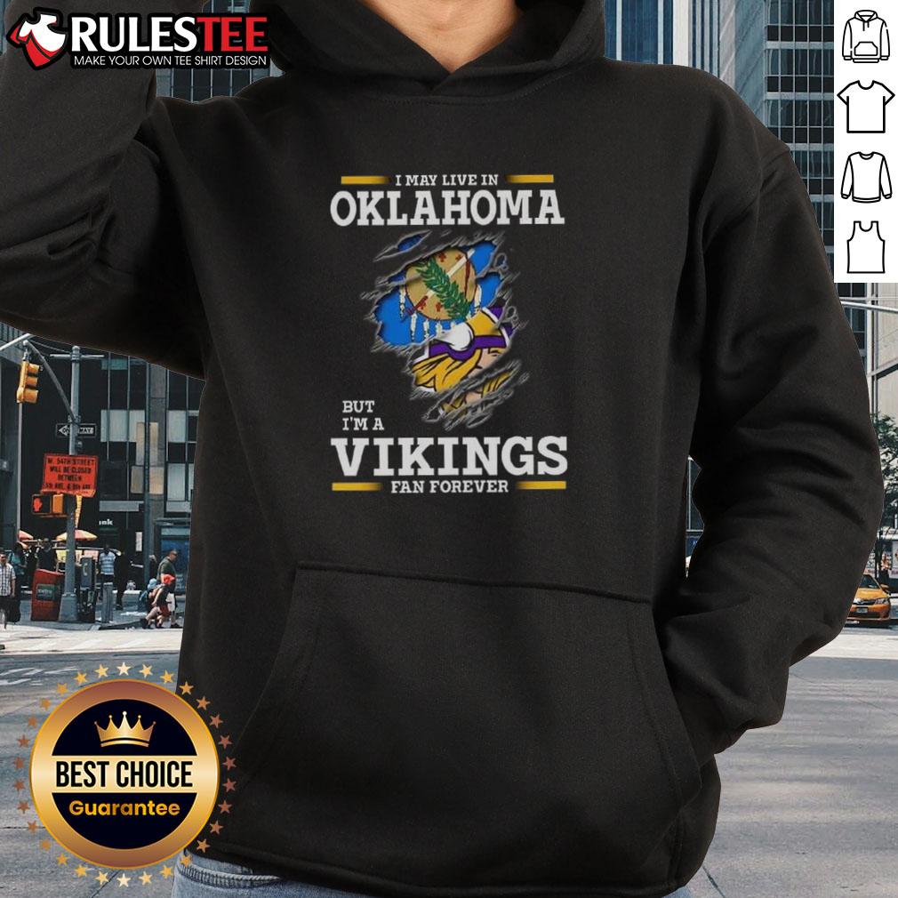 Awesome I May Live In Oklahoma But I'M A Minnesota Vikings Fan Forever Hoodie Awesome hoodie for Minnesota Vikings fans living in Oklahoma, showcasing team pride and style.