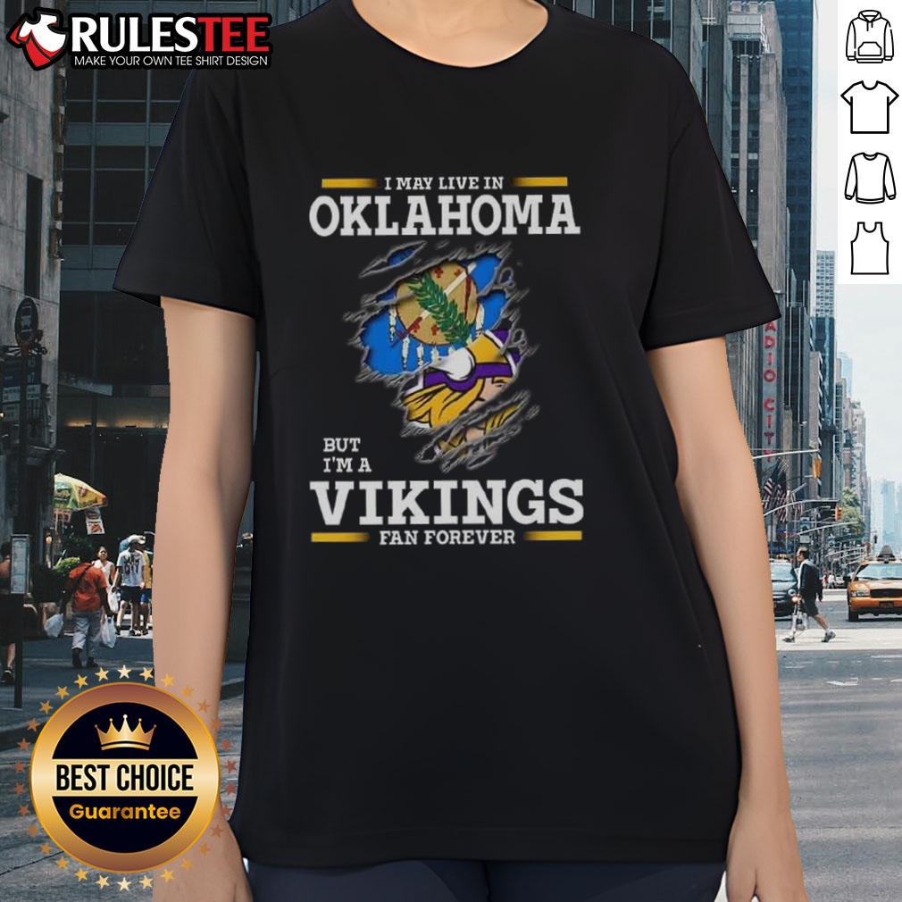 Awesome I May Live In Oklahoma But I'm A Minnesota Vikings Fan Forever Ladies-Tee Awesome ladies tee featuring 'I may live in Oklahoma but I'm a Minnesota Vikings fan forever' design for passionate fans.