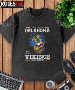 Awesome washed t-shirt featuring 'I may live in Oklahoma but I'm a Minnesota Vikings fan forever' design.