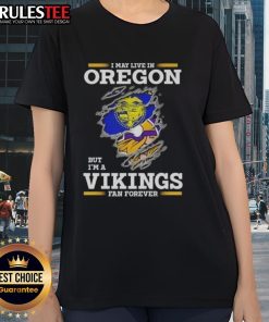 Womens tee featuring 'I May Live In Oregon But I'm A Minnesota Vikings Fan Forever' design, perfect for passionate fans.