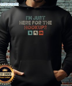 Awesome hoodie for camping enthusiasts featuring 'I'm Just Here For The Hookups' design, perfect for RV camper adventures.