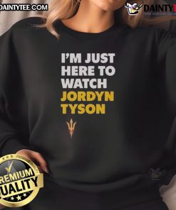 Alt Text: Awesome Jordyn Tyson I'm Just Here to Watch sweatshirt featuring a stylish design perfect for casual wear.
