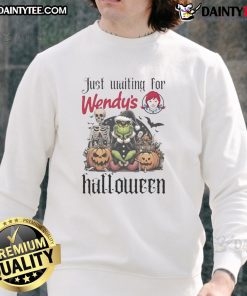 Awesome Grinch Halloween sweatshirt from Wendy's, perfect for festive fall wear and holiday celebrations.