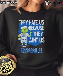 Alt Text: Kansas City Royals Grinch Christmas sweatshirt with 'They Hate Us Ain't Us' design, perfect for festive fans.