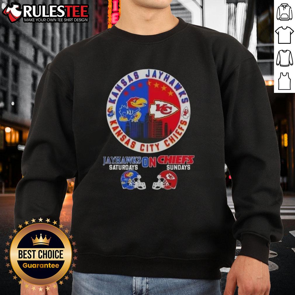 Awesome Kansas Sports Jayhawks Saturdays On Chiefs Sundays Helmets Football Sweatshirt Awesome Kansas Sports sweatshirt featuring Jayhawks and Chiefs helmets, perfect for football Saturdays and Sundays.