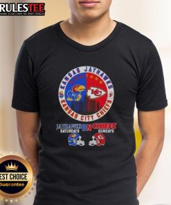 Awesome Kansas Sports Jayhawks Saturdays On Chiefs Sundays Football T-Shirt featuring team helmets design.
