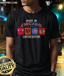 Alt Text: Awesome Made In Chicago sports T-shirt featuring Bulls, Bears, Cubs, and Blackhawks logos in vibrant colors.
