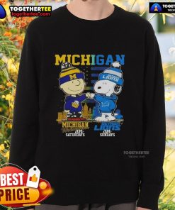Awesome Michigan Sports sweatshirt featuring Charlie Brown Wolverines and Snoopy Detroit Lions skyline design.