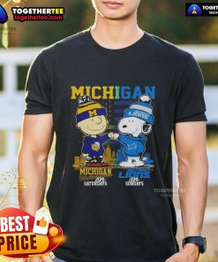 Awesome Michigan Sports Charlie Brown Wolverines t-shirt featuring Snoopy and Detroit Lions against a skyline backdrop.