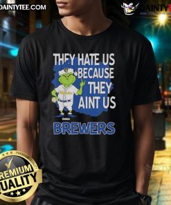 Alt Text: Awesome Milwaukee Brewers Grinch Christmas T-Shirt featuring They Hate Us Ain't Us design in festive colors.