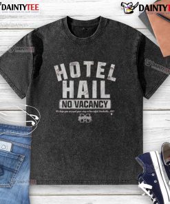 Awesome Mississippi State Football No Vacancy Hotel Hail Washed T-Shirt displayed on a rustic background.