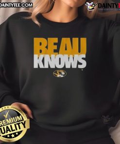 Beau Pribula wearing an Awesome Missouri Football sweatshirt, showcasing team spirit and style on game day.