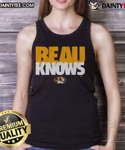 Beau Pribula wears a stylish tank top while showcasing his skills on the football field in Missouri.