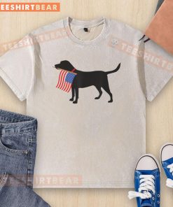 Awesome patriotic dog wearing an American flag t-shirt for Fourth of July, perfect for pet lovers celebrating USA.