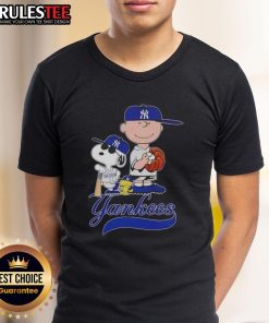 Alt Text: Awesome Peanuts characters Snoopy and Charlie Brown on a New York Yankees baseball T-shirt design.