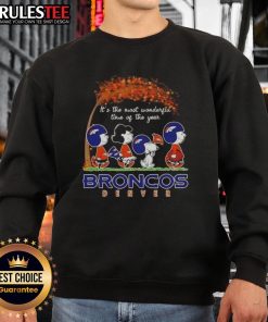 Awesome Peanuts sweatshirt for Denver Broncos fans celebrating the holidays with football spirit.