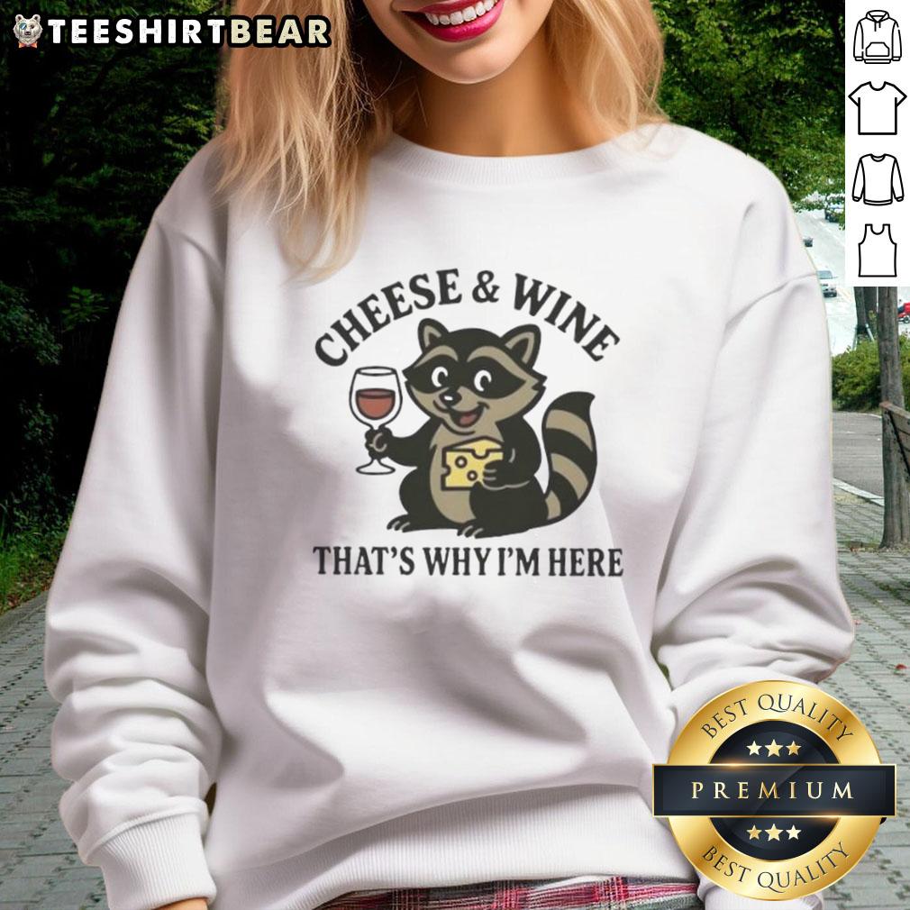 Awesome Raccoon Cheese And Wine That'S Why I'M Here Sweatshirt Awesome raccoon graphic on a cheese and wine sweatshirt, perfect for cozy gatherings and casual outings.