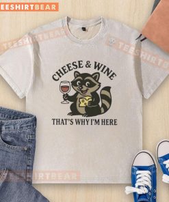 Awesome raccoon graphic on a cheese and wine themed washed t-shirt, perfect for casual and fun fashion lovers.