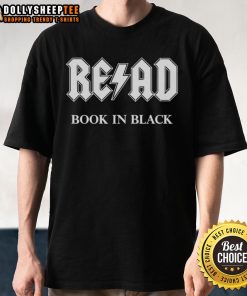 Alt Text: Awesome read book held by a person wearing a black AC/DC t-shirt, showcasing a stylish reading vibe.