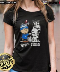 Alt Text: Awesome Snoopy and Charlie Brown graphic on a Los Angeles Dodgers x Las Vegas Raiders skyline ladies tee.