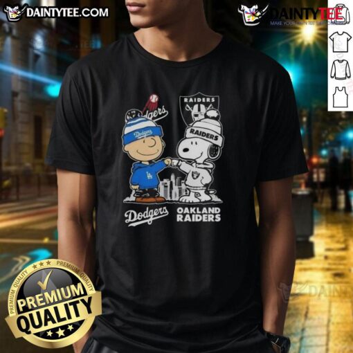 Alt Text: Awesome Snoopy and Charlie Brown t-shirt featuring Los Angeles Dodgers and Las Vegas Raiders skyline design.