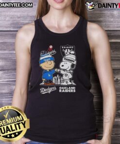 Alt Text: Awesome Snoopy and Charlie Brown tank top featuring Los Angeles Dodgers and Las Vegas Raiders skyline design.