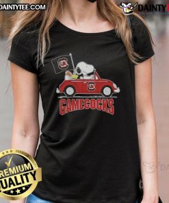 Alt Text: Snoopy driving a car in a South Carolina Gamecocks football ladies tee, showcasing team spirit and style.