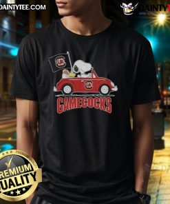 Alt Text: Awesome Snoopy driving a car on South Carolina Gamecocks football t-shirt design, perfect for fans.