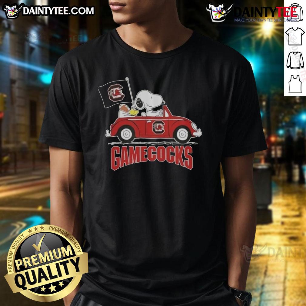 Awesome Snoopy Driving Car South Carolina Gamecocks Football T Shirt Alt Text: Awesome Snoopy driving a car on South Carolina Gamecocks football t-shirt design, perfect for fans.