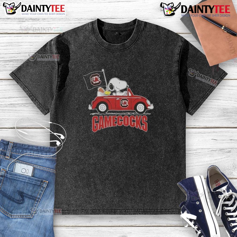 Awesome Snoopy Driving Car South Carolina Gamecocks Football Washed T Shirt Snoopy driving a car in a South Carolina Gamecocks football washed t-shirt, showcasing team spirit and fun.