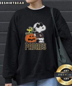 Alt Text: Awesome Snoopy San Diego Padres MLB pumpkin Halloween sweatshirt featuring Peanuts cartoon design for 2025.